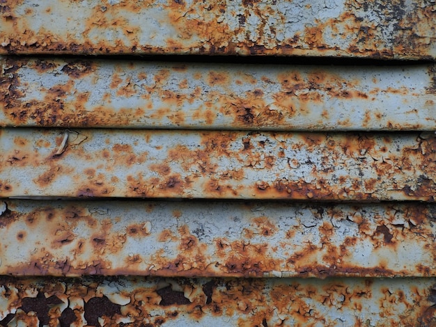 A closeup shot of a rusty metal surface Corosion