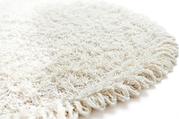 Photo closeup of soft fluffy white shag rug texture