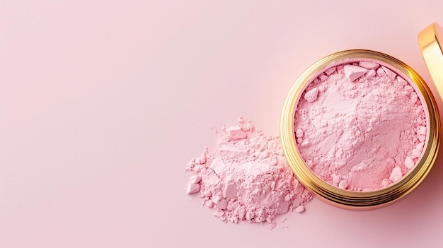 CloseUp of Spilled Pastel Pink Cosmetic Powder in a Gold Jar on Matte Background