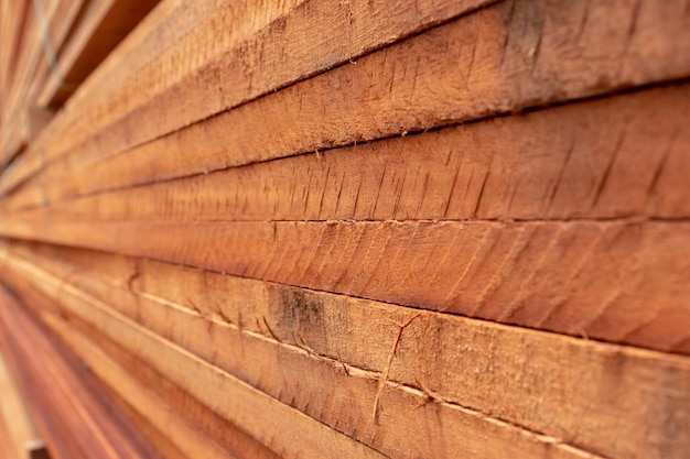 Closeup on a stack of lumber planks