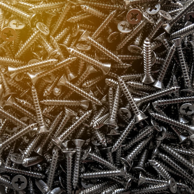 Closeup of steel screws background