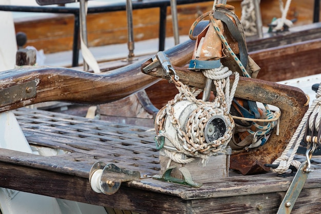 Closeup of a system for attaching ropes and carabiners on a boat