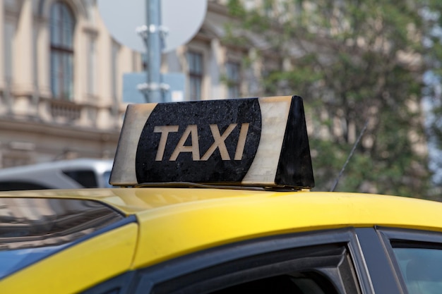 Closeup of a taxi sign on the top a taxi in Budapest Hungaria