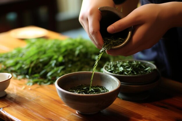 A closeup of tea leaves being poured into a teap Tea Photos9jpg