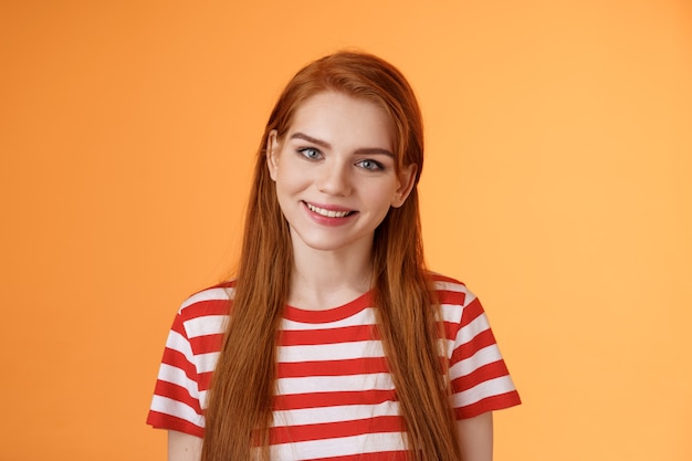 Closeup tender cute redhead young woman smiling joyfully express happiness friendly emotions look ca...