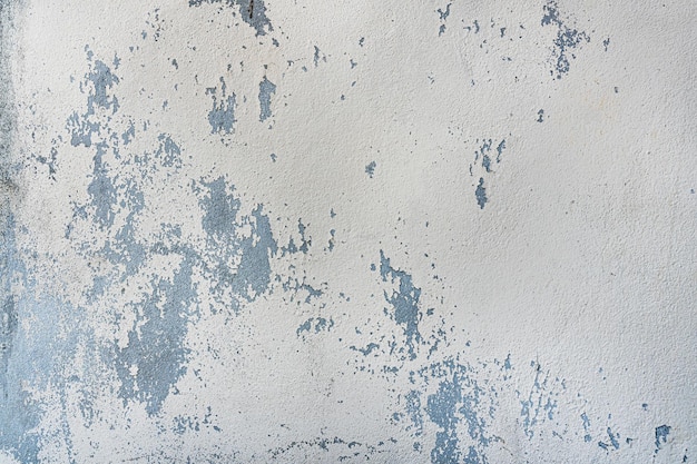 Closeup texture abstract of old and peeling blue color wall background Copy space for text