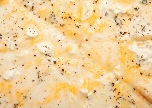 Closeup texture of cheese pizza