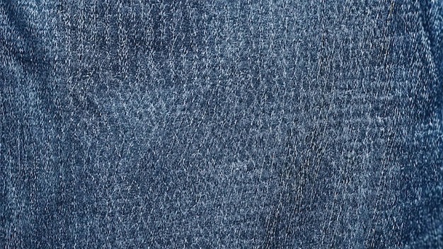 Photo closeup textured blue denim fabric background