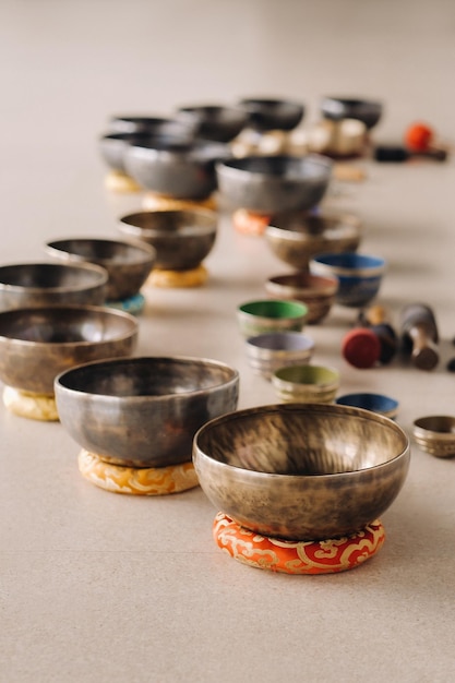 A closeup of a Tibetan singing bowl Translation of mantras Transform your impure body speech and mind into a pure exalted body speech and mind of a Buddha