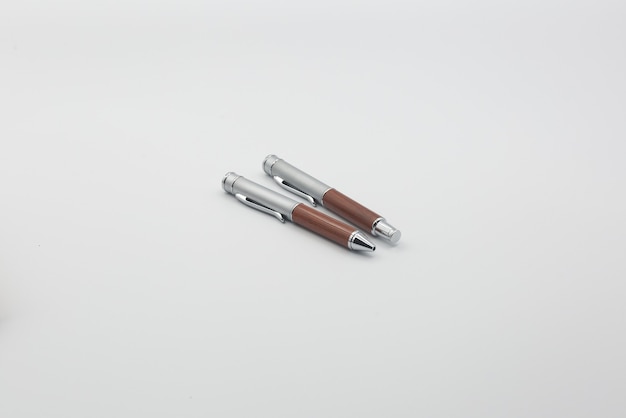 Closeup of two ballpoint pens isolated on a white background