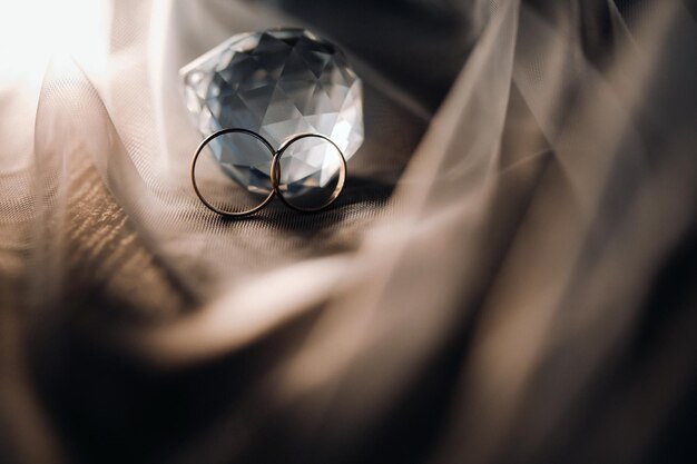 Closeup of two gold wedding rings for a wedding