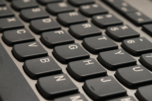 Closeup view of a black laptop keyboard