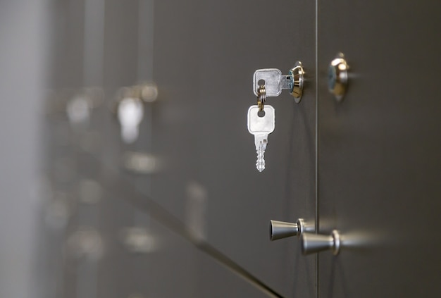 Closeup view of a key inserted into locker