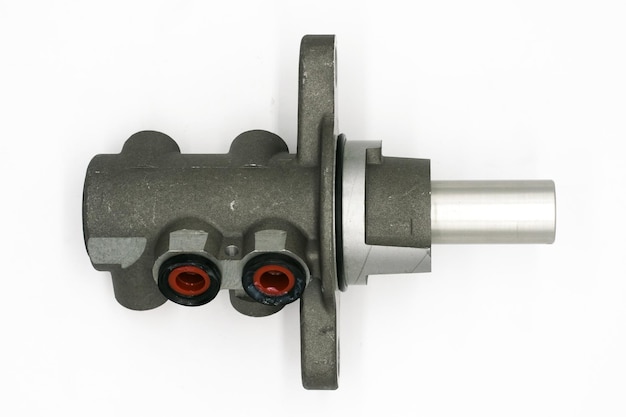 Closeup view of the master cylinder on a white background