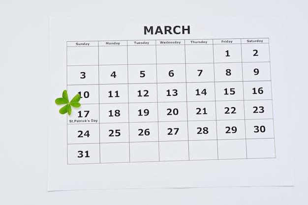 Closeup view of paper calendar sheet with selected date March 17