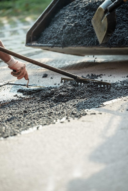 Closeup view of paving the road