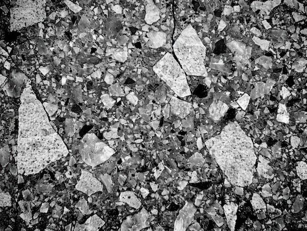 Photo a closeup view of a textured surface with various stone fragments and patterns