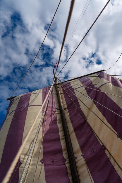 Closeup of viking ship sailing majestically against a clear blue sky