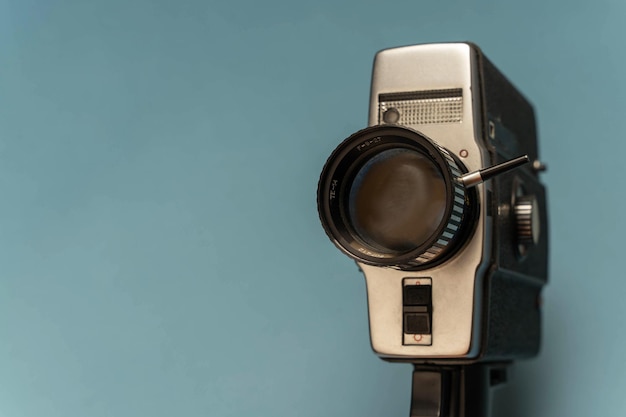 A closeup of a vintage movie camera shooting on 8 mm film from the 80s