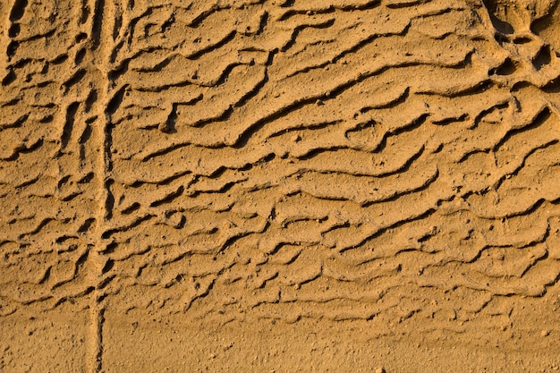 Closeup of Vlychada beach volcanic ash sand rock formation on Santorini island in Greece