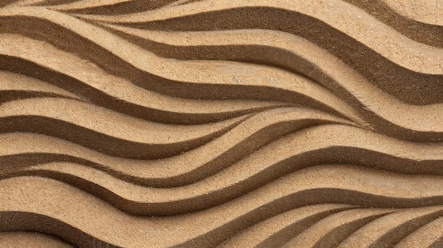 a closeup of a wave pattern in the sand on a beach