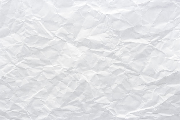 Closeup to white crumpled paper texture wall,abstract