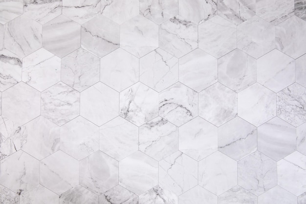 Closeup of the white marble wall with hexagon tiles for texture and background