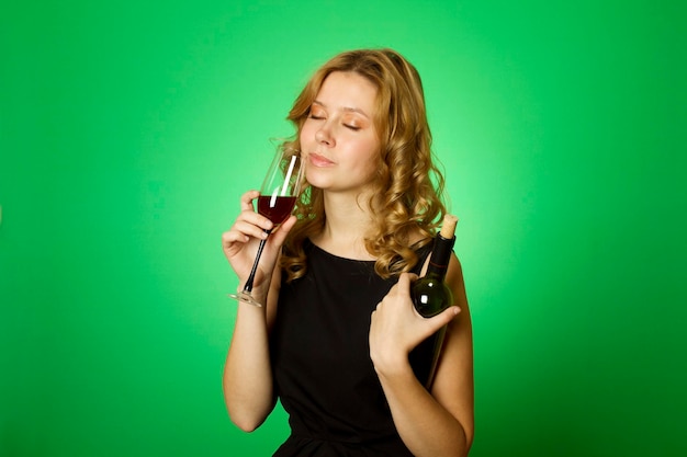 Closeup of woman with glass red wine