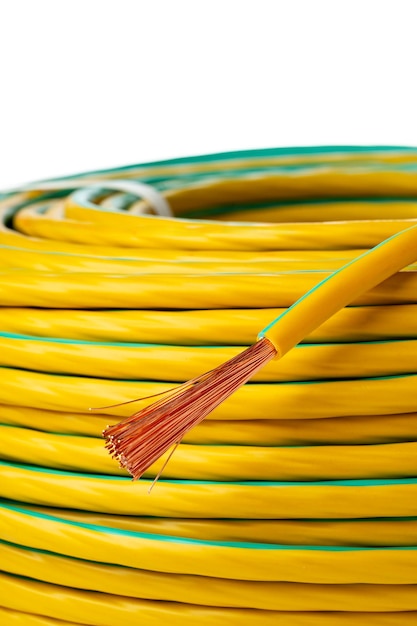 Closeup of yellow and green electrical wire spool