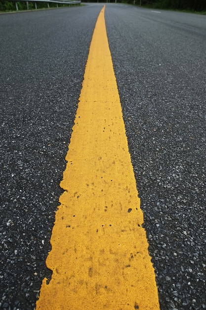 closeup yellow sign on the street., Asphalt Texture