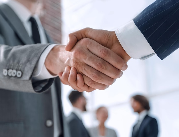 Closeupreliable handshake of business partners