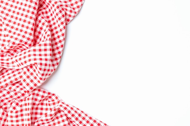 Cloth cotton crumpled tablecloth Top view fabric red and white checkered isolated on a white background with copy space