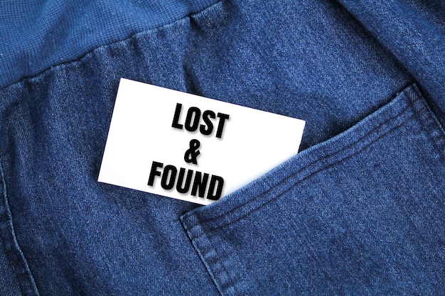 Photo cloth and white paper with the words lost amp found the concept of lost and found looking for someth