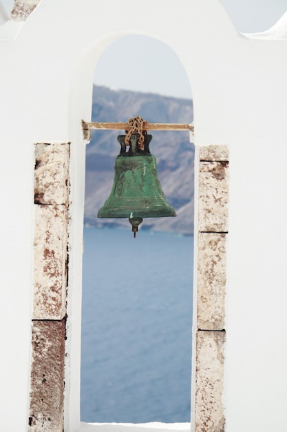 Photo clothes hanging on wall by building