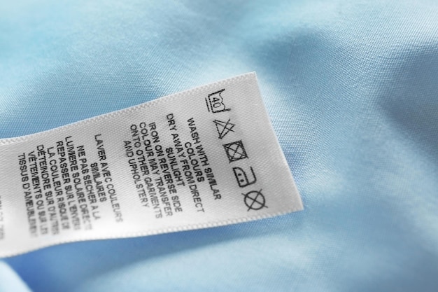 Photo clothing label with laundry instructions closeup