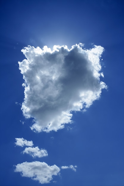 Photo cloud on blue sky sun backlight light halo