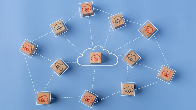 Photo cloud computing concept cloud icons on connected wooden cubes the idea of sharing or transferring data online