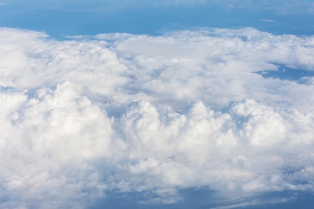 Cloud cumulus from the altitude of the airplane flight the atmosphere weather