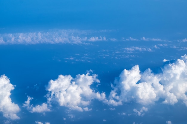 Cloud texture and blue sky view from airplane