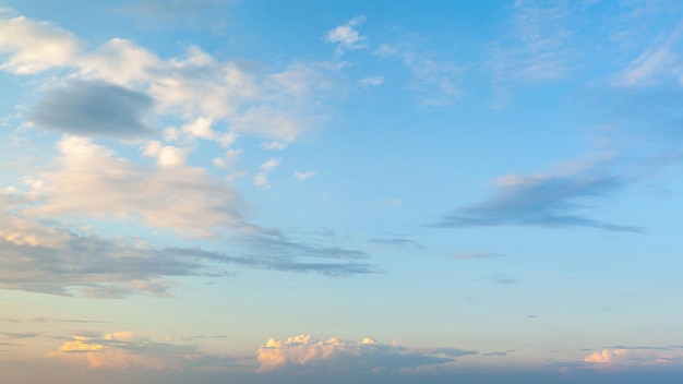 Clouds in the blue sky Landscape image of the sky and clouds at sunset in the evening