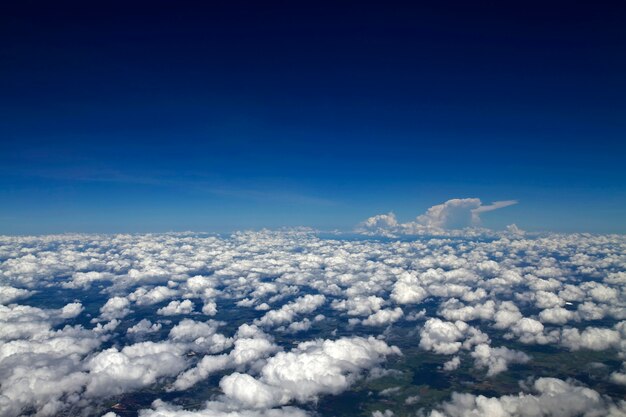 Clouds in the sky (sea cloud) as seen from high angle on the plane