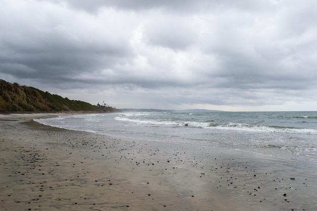 Cloudy beach shore coastline waves