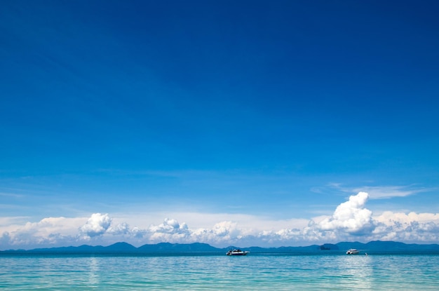 Cloudy blue sky leaving for sea