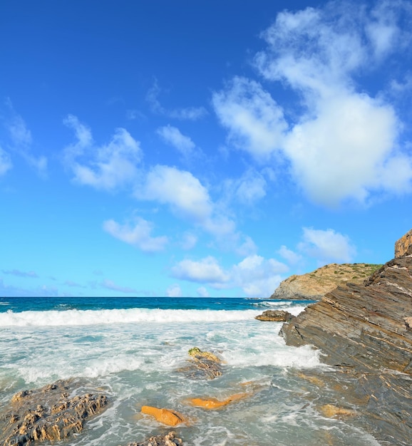 Cloudy sky over Argentiera rocky shore Sardinia