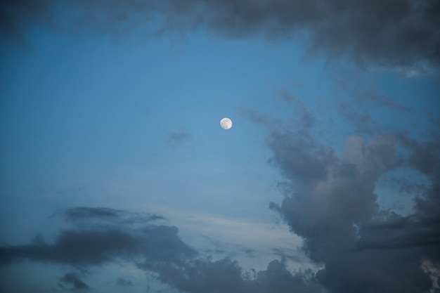 Cloudy sky and moon in the evening