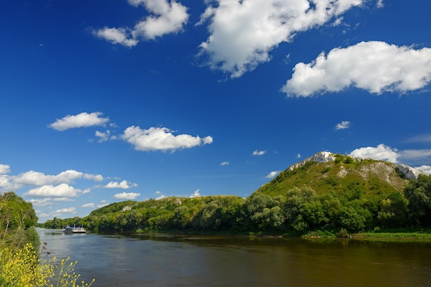 Cloudy sky above the river at the mountain