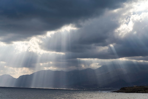 Cloudy sky with sun rays