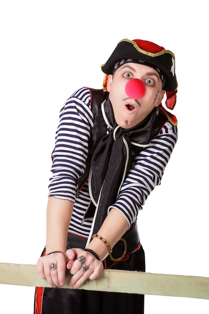 Clown in a pirate suit isolated on a white background