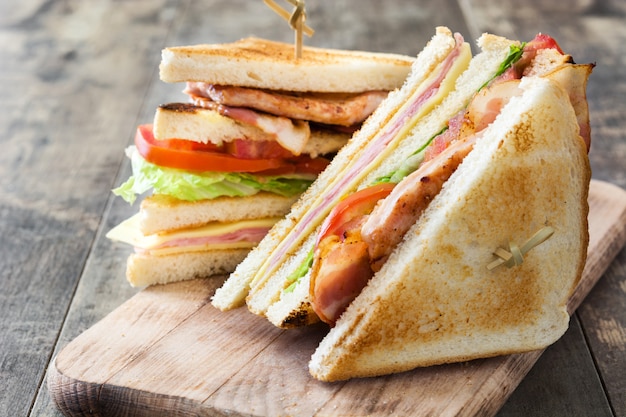 Club sandwich on wooden table