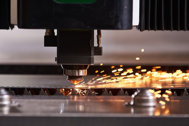 CNC Laser cutting of metal, modern industrial technology.